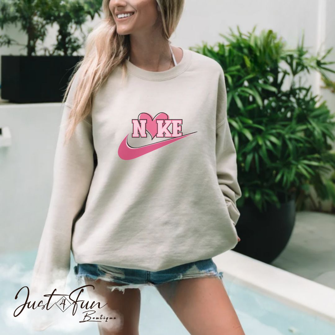 www.j4funboutique.com Nike Pink heart hoodie/sweatshirt