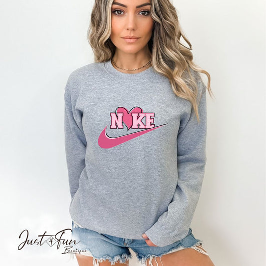 www.j4funboutique.com Nike Pink heart hoodie/sweatshirt