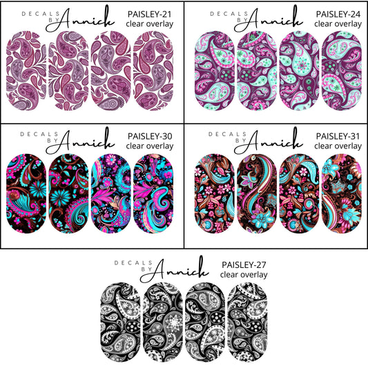 Water transfer decals for nails. Water decals can be applied to natural nails, tips, press-ons, resin and powder finishes, gel varnish or regular varnish. IMPORTANT: Water decals work best on sticky bases, a no-smudge top coat or with gel liquids. I strongly suggest ORLY brand Bonder (Rubberized basecoat), available in pharmacies and on Amazon. I cannot guarantee the results of decals when used with dip liquids, as these are corrosive and can melt waterslide decal paper. Decals on clear overlay paper will b